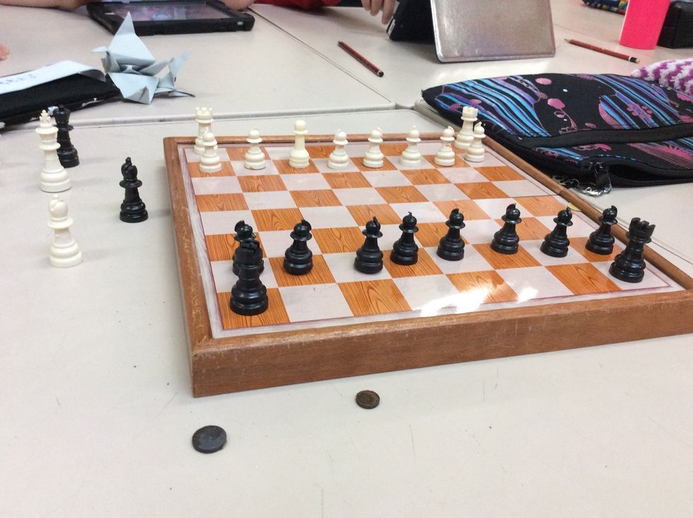 Set up the castles or rooks on the side behind the pawns on the edge.