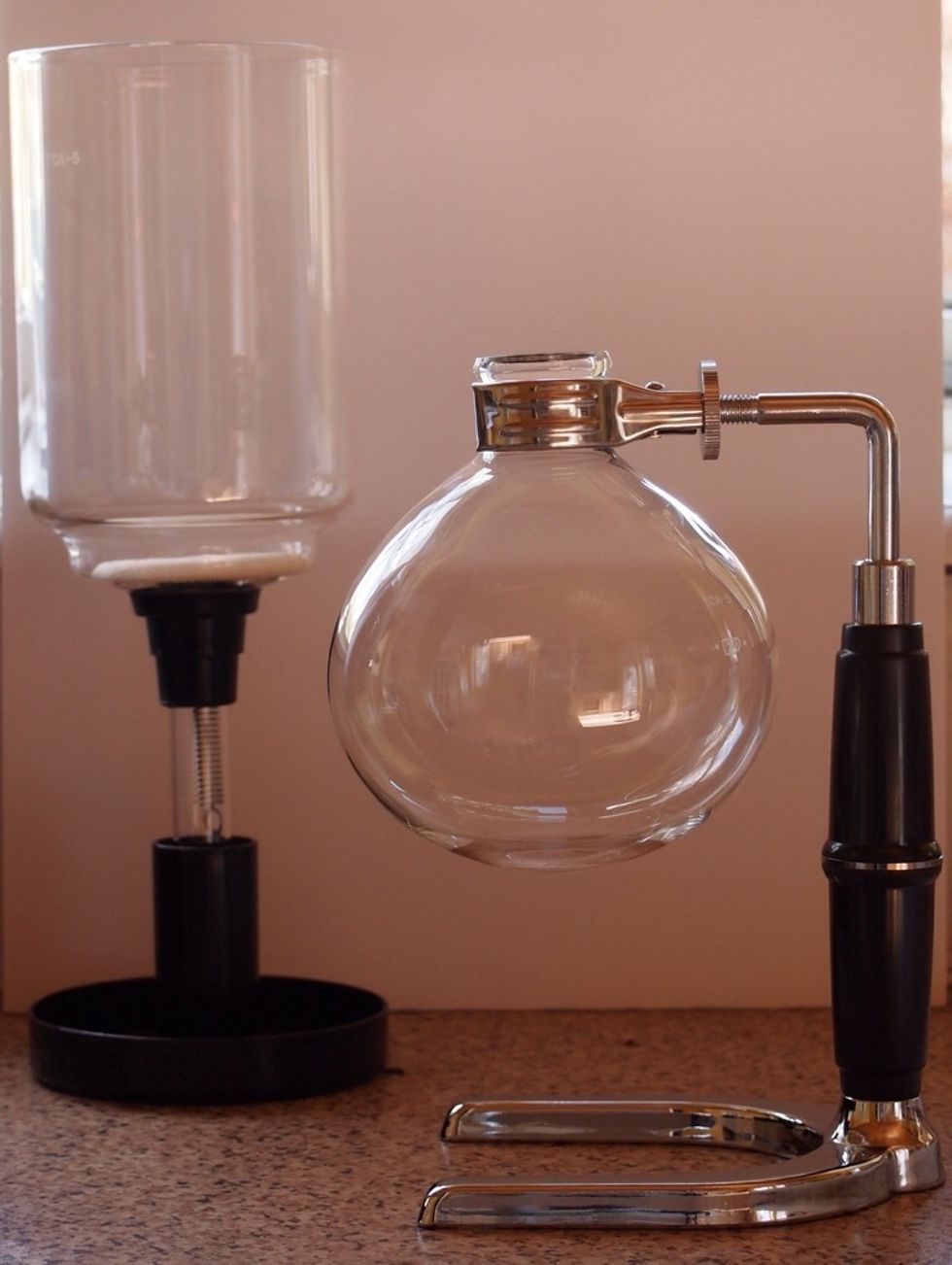 Set up the vacuum coffee pot and make sure you have any accessories to hand.