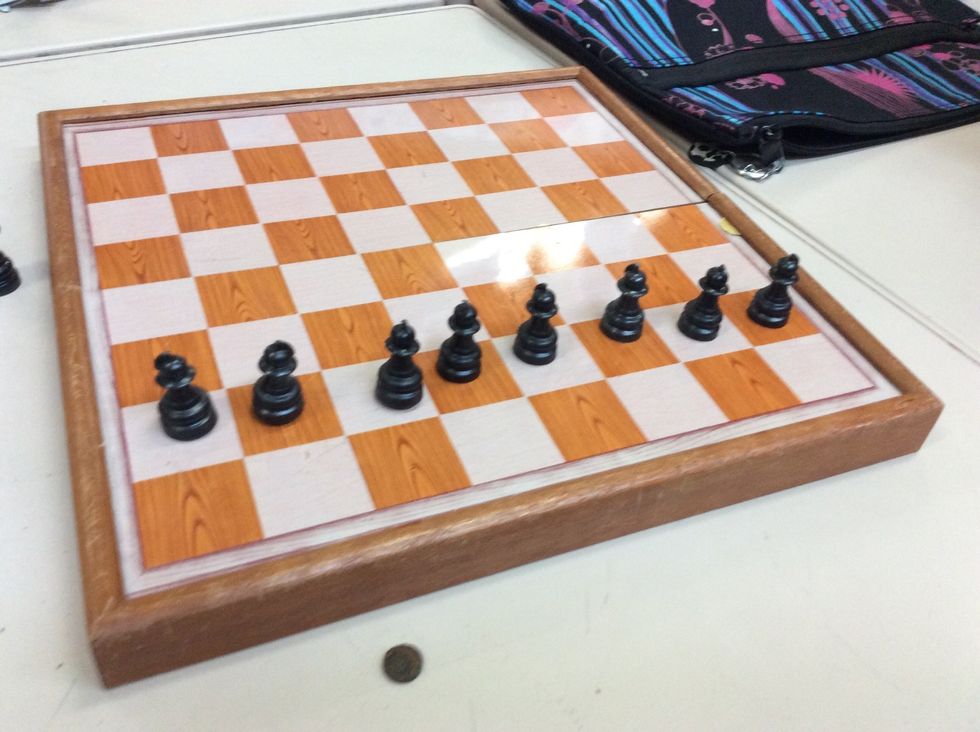 Set up you pawns in a formation 1 row away from the edge.