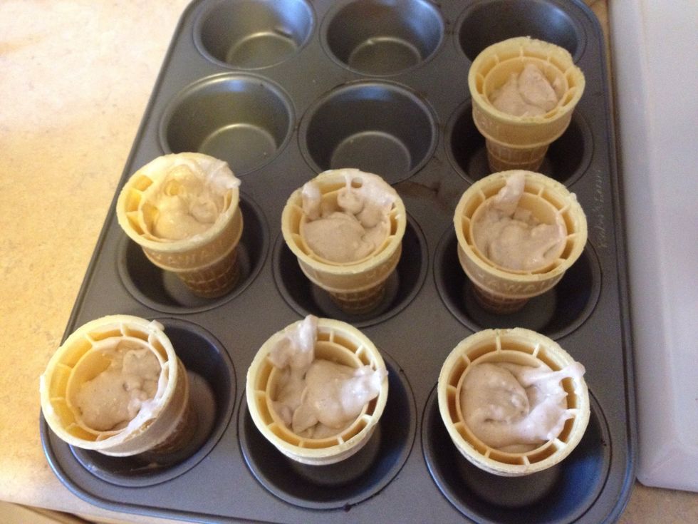 Set your cones in a muffin tray so they don't fall. Fill cones to 2/3 full (not much more or they will overflow.)