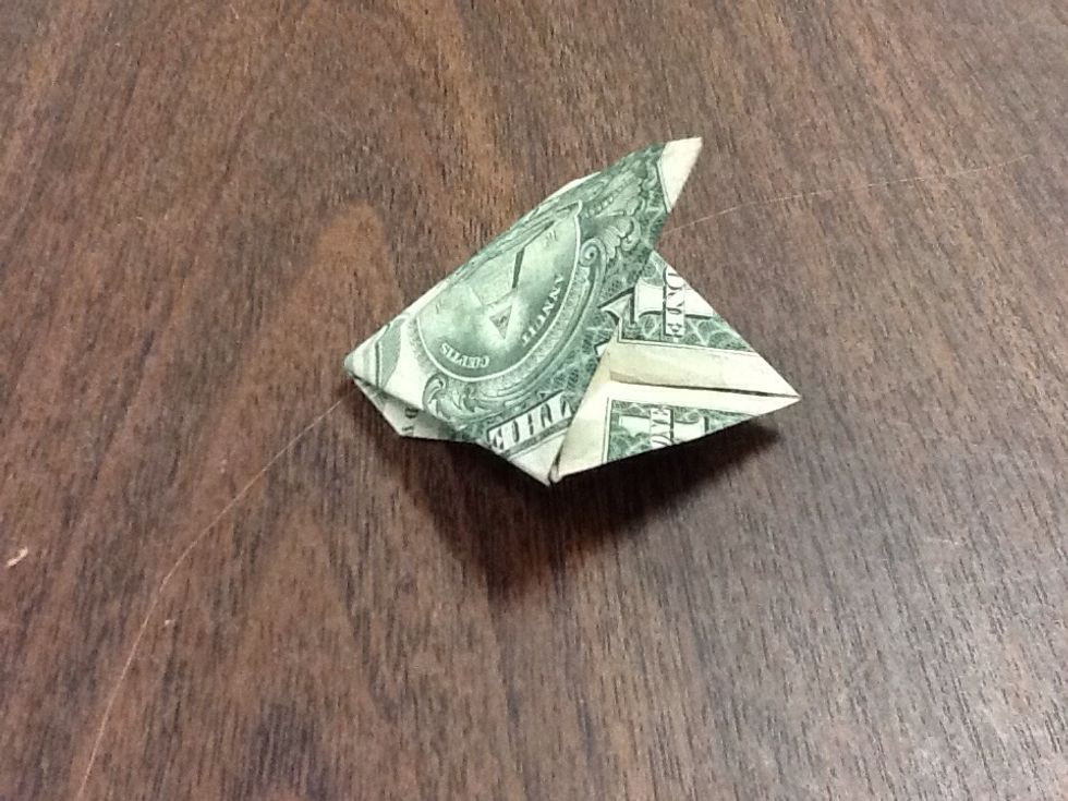 Set your frog down on the table, and if it's sitting up by itself with the mouth open like this, then you've done it right. Now you can put a smile on your waitress's face when you eat out.