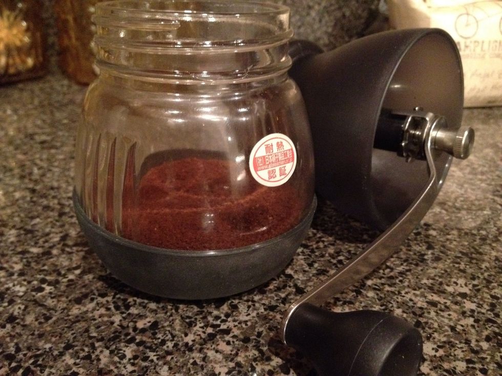 Set your grinder to a medium-fine grind. You may like your grind a little finer, but make sure not to grind it too fine or it will be tough to press the water through.