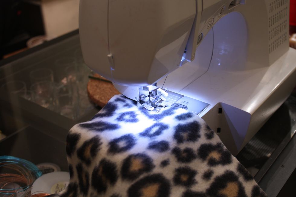 Set your machine to a small width zigzag with a longer stitch length. I used a 2 width and a 4 length on my Brother. Other machines may vary. I also used a walking foot. I don't pin because I am lazy