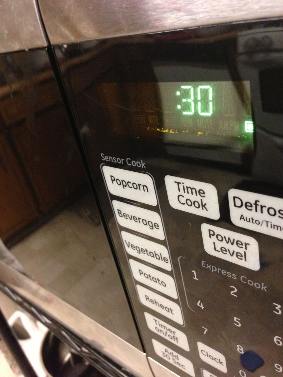 Set your microwave for :30 seconds. This should be enough time to get your marshmallows gooey enough for the next step.