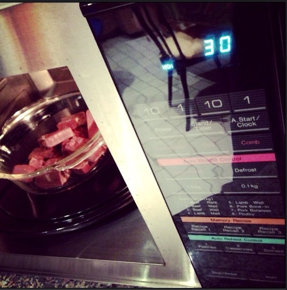 Set your now-cut Mars Bars in the microwave for approximately 30-50 seconds. This depends on your microwave's heating capacity. (Try with 30secs first - put back in if you want it to melt some more.)