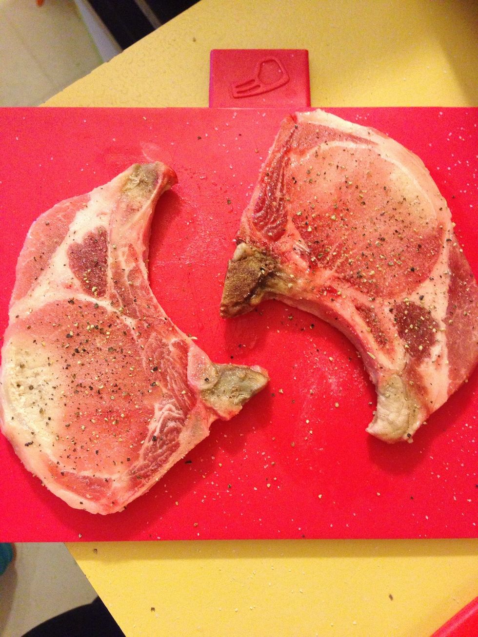 Set your pork chops on the cutting board and rub on each side salt and pepper- about 1/4 teaspoon of each, more or less.