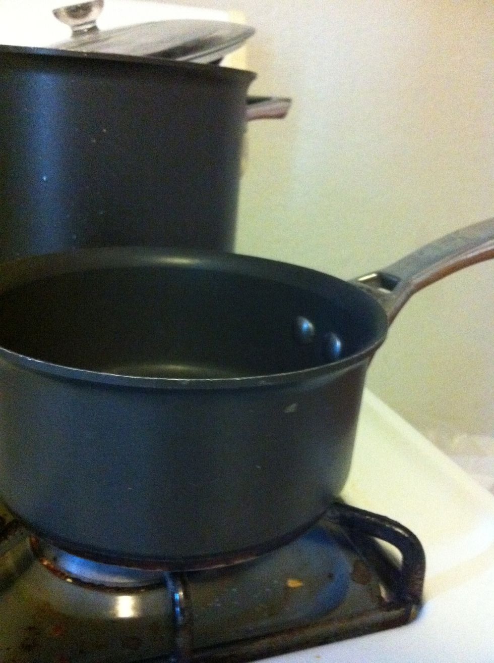 Set your pot on low and let the butter melt and sizzle. NOTE: Don't let butter be burnt (goldfish brownish) add The marshmallows as soon as they melt or else you do it wrong.