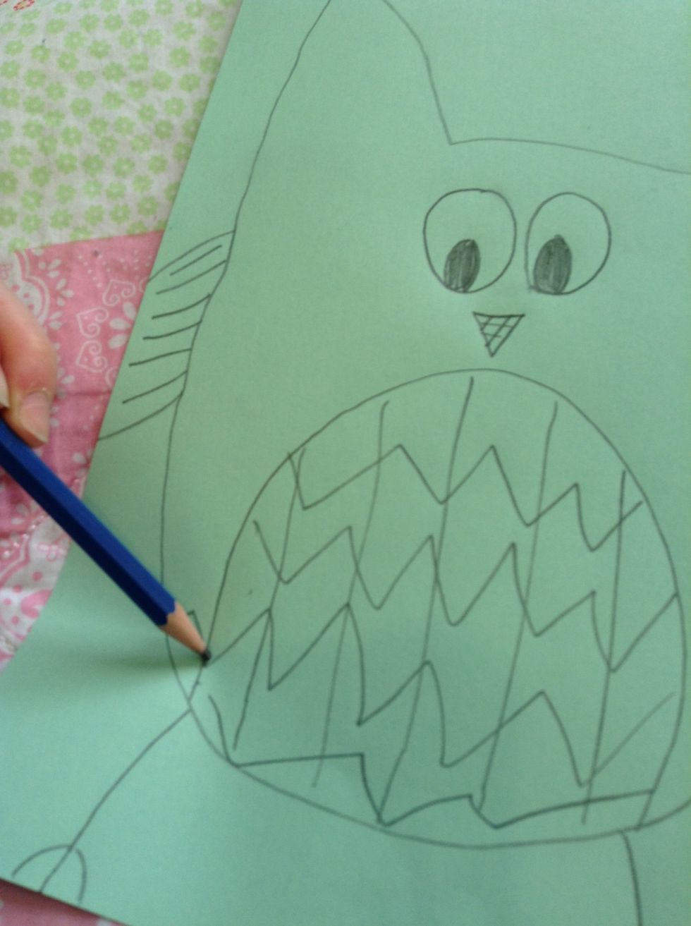 Seventh: add design to the wings, beak, and belly.