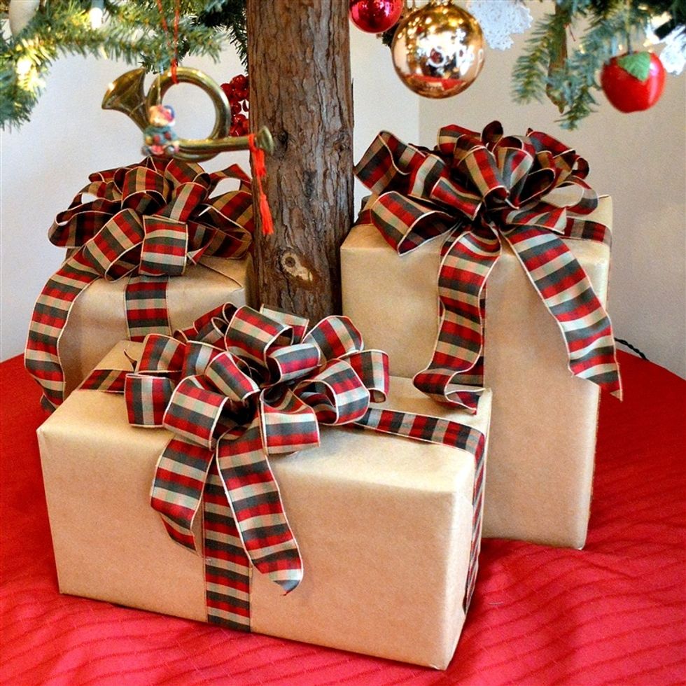 Several packages can be placed at the base of a Christmas tree to make it look pretty after the presents have been opened.