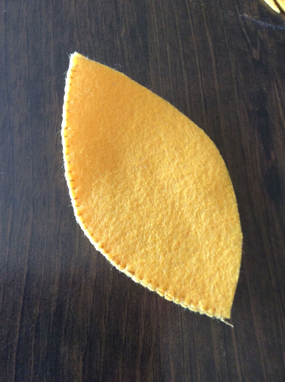 Sew a blanket or back stitch along one edge.