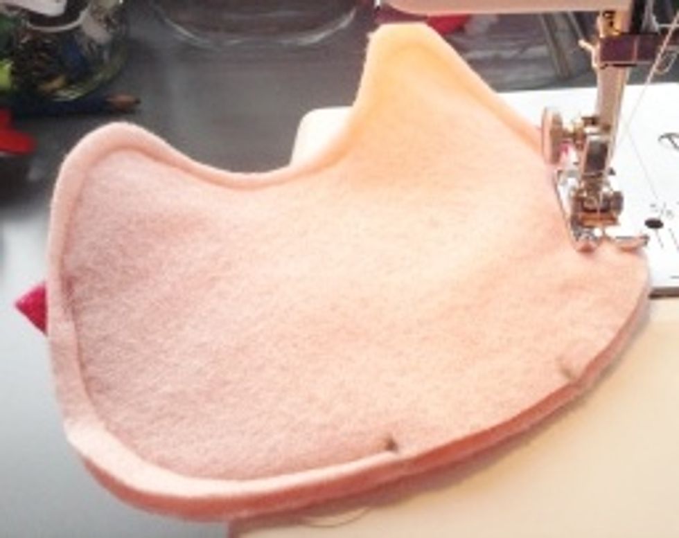 Sew all the way around the edges, making sure to catch the wings as you sew. Be sure to leave an open space for the stuffing.