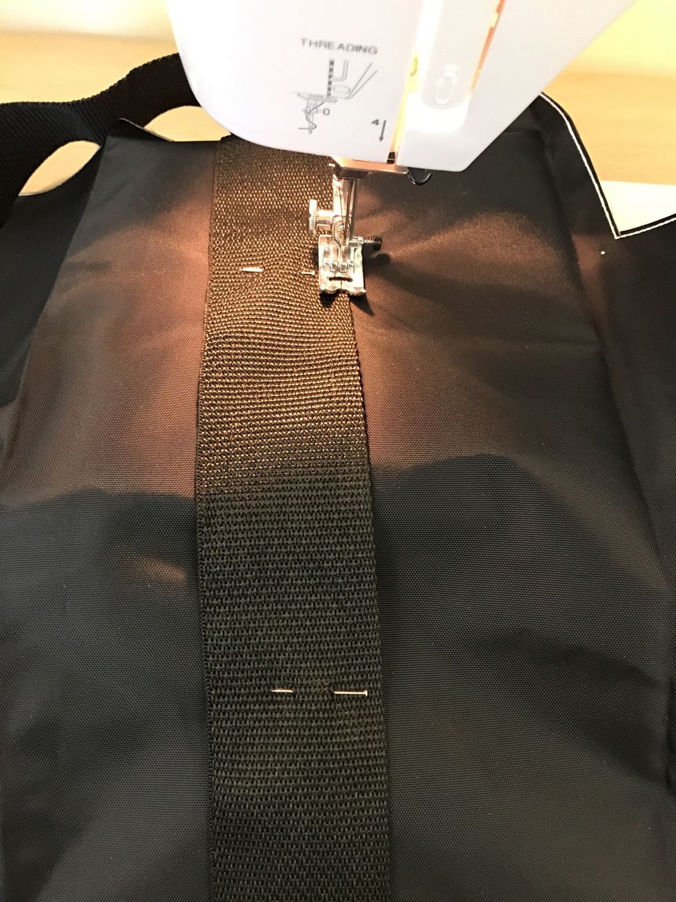 Sew along the edge following the dashed line.