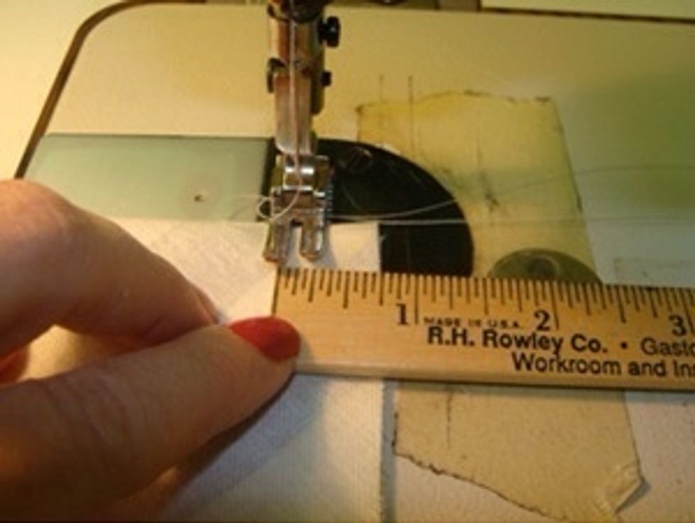 Sew along the top 3/4'' down from the edge. This will create a 3/4'' banding. When you reach the other end of the banding, tuck under the extra fabric and sew to the end.