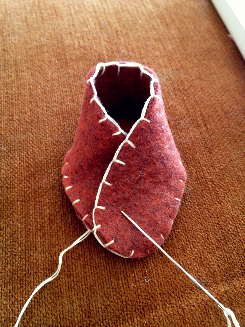 Sew around the slipper.