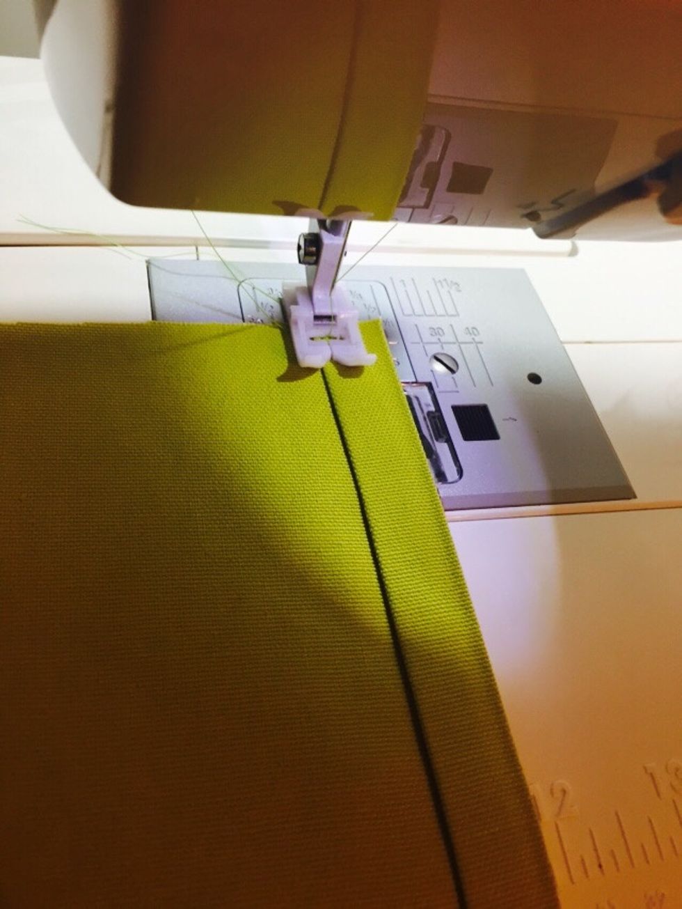 Sew down the pressed flap to secure into place the top seam of your pocket.