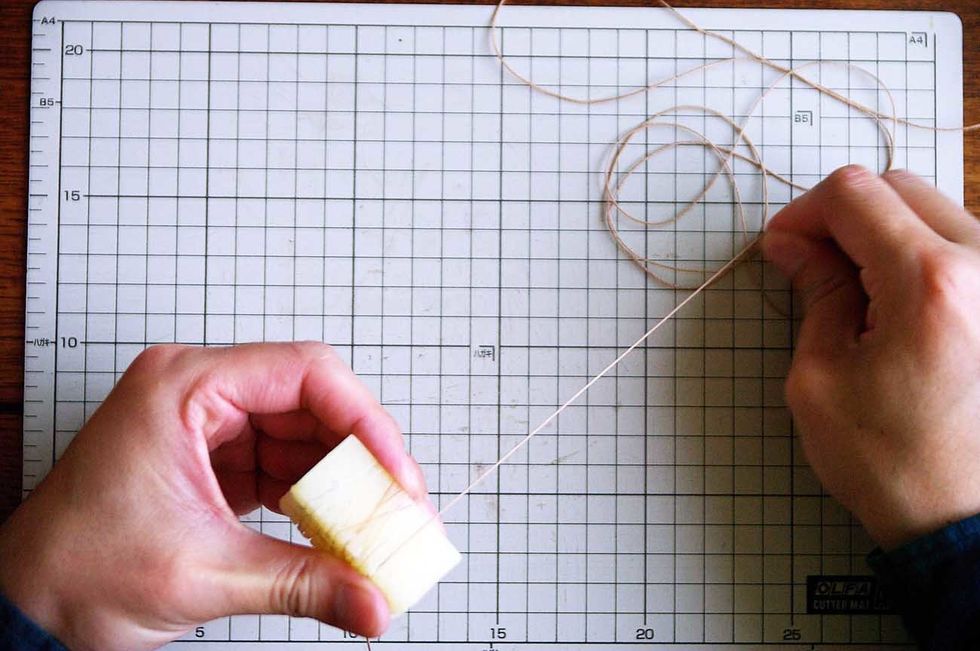 Sew it with a thread. Use the thread which I pulled with solder.