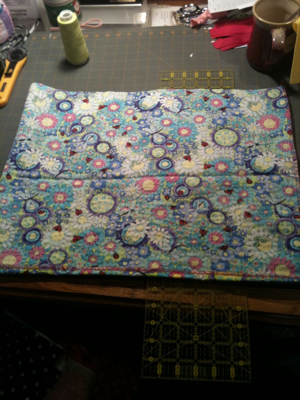Sew or serge the side seam, then lay the dress flat with the seam on the right (reverse this if you are cutting lefty!)