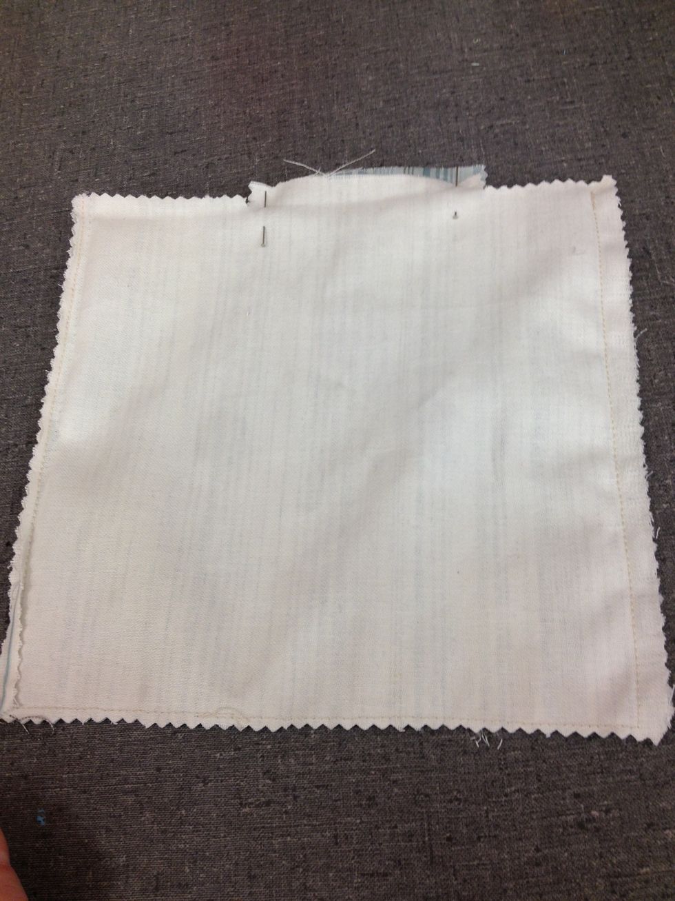 Sew pocket leaving small center piece open. Trim sides with pinking shears, trim corners to reduce bulk, and turn right side out.