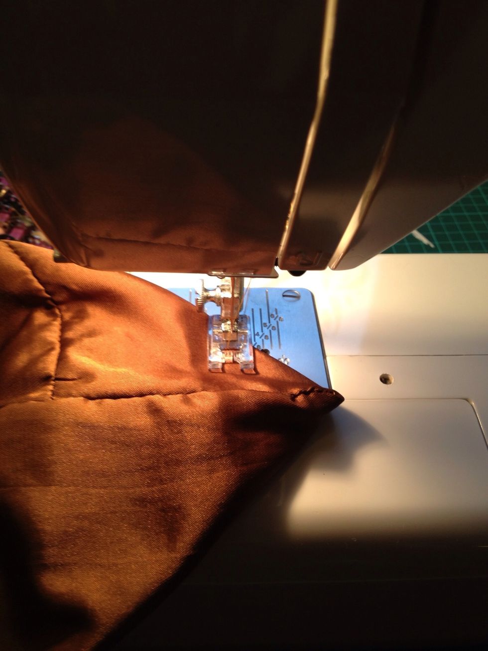 Sew straight across the corner. Do the same on the other corner.