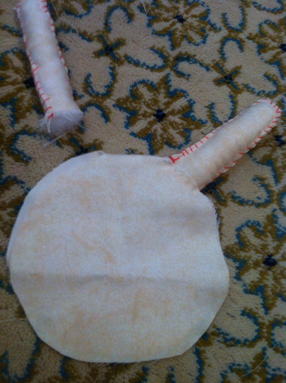 Sew the first ear with the face from out side