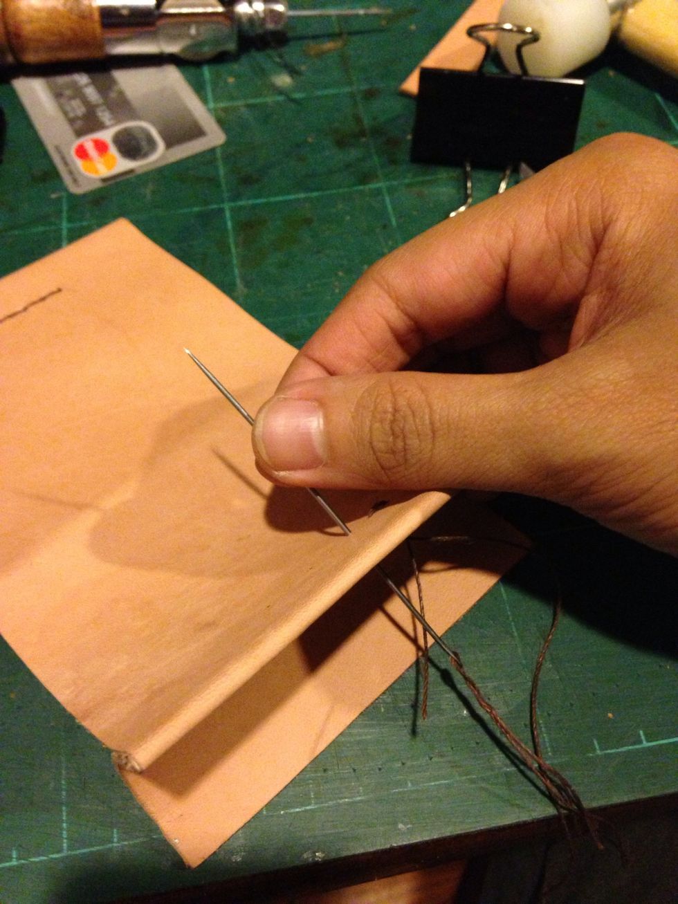 Sew the leather together..