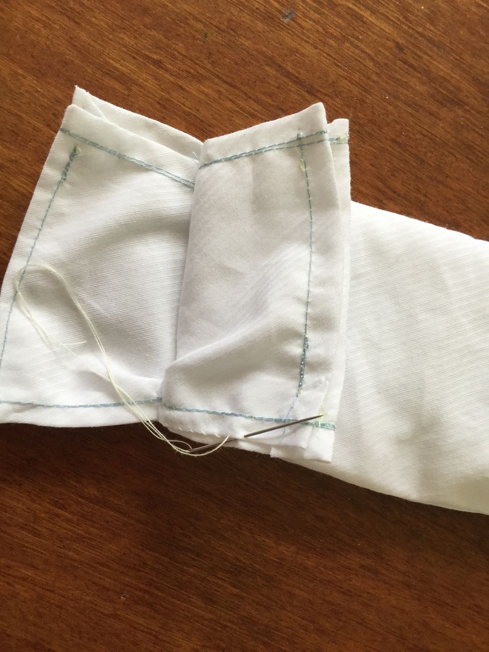 Sew the lining and outer case together by hand. Leave the top part open as we will turn it down later.