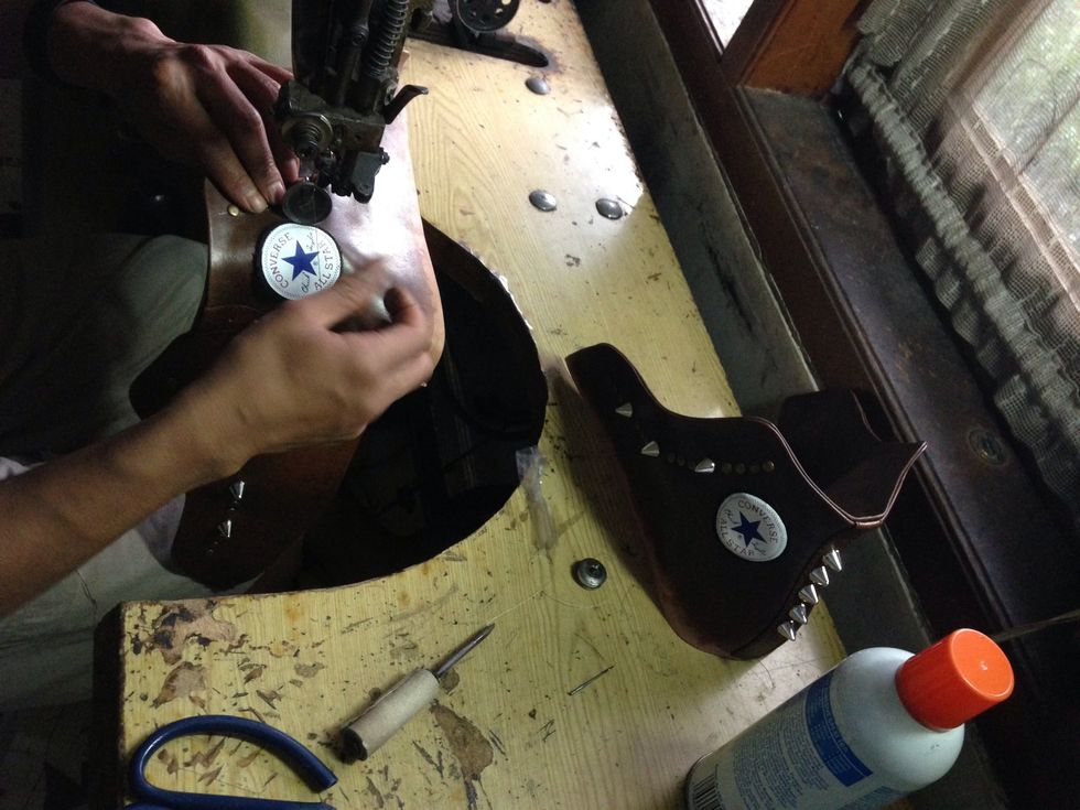 Sew the logo to the upper carefully round the edges of the logo..