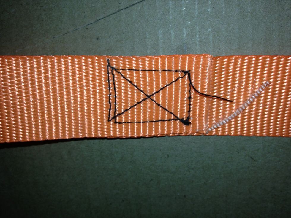 Sew the long strap on to the ratchet with a box and a "X" through it where you cut the original strap off.