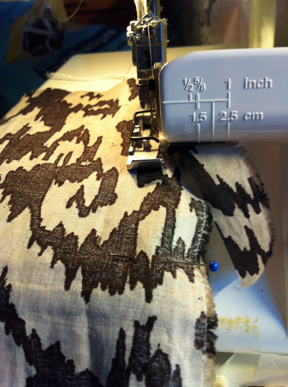 Sew the longer edge with a seamer or a regular sewing machine to create a long tube.