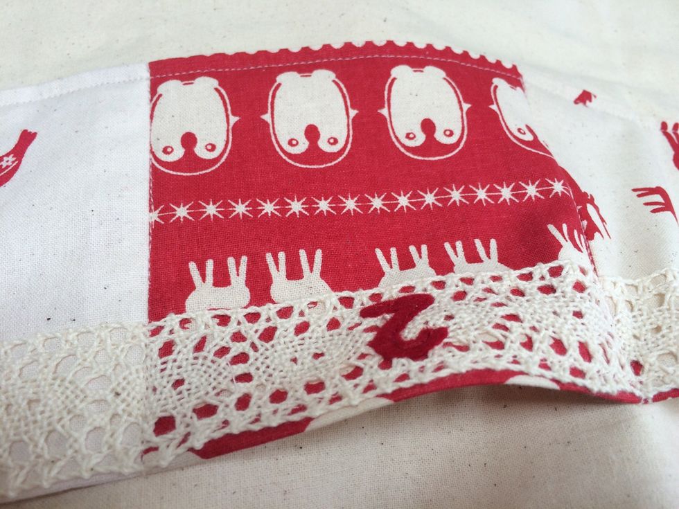 Sew the row in place and then sew down the join between each square to make individual pockets