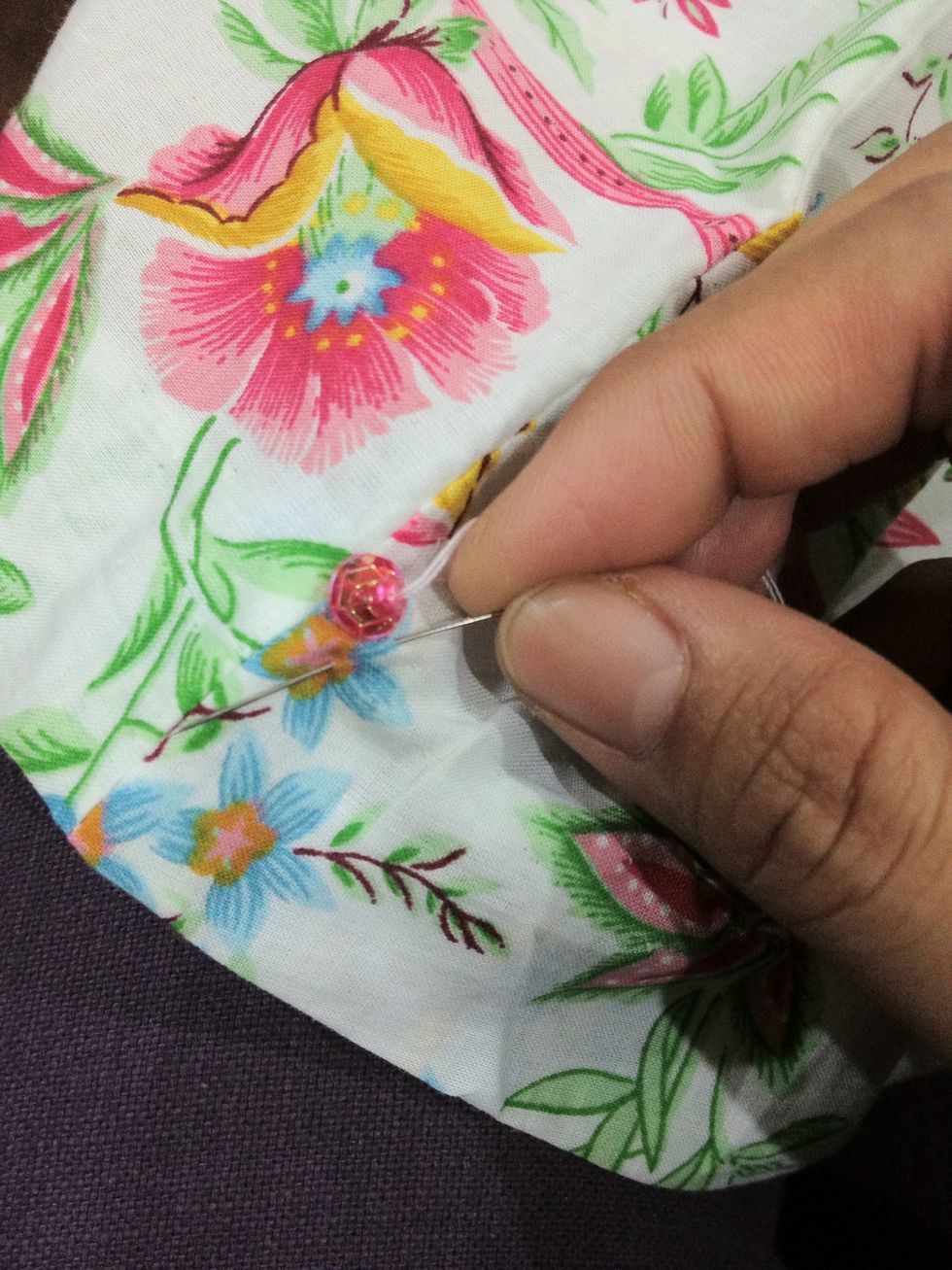 Sew the sequin and try the same step again just left below of the first sequin.