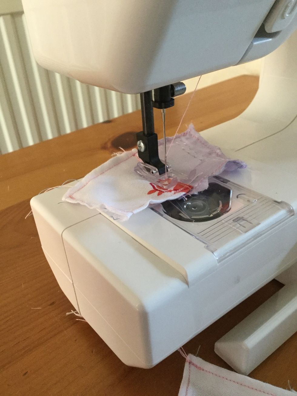 Sew two squares of different material together. Do this for every square you have.