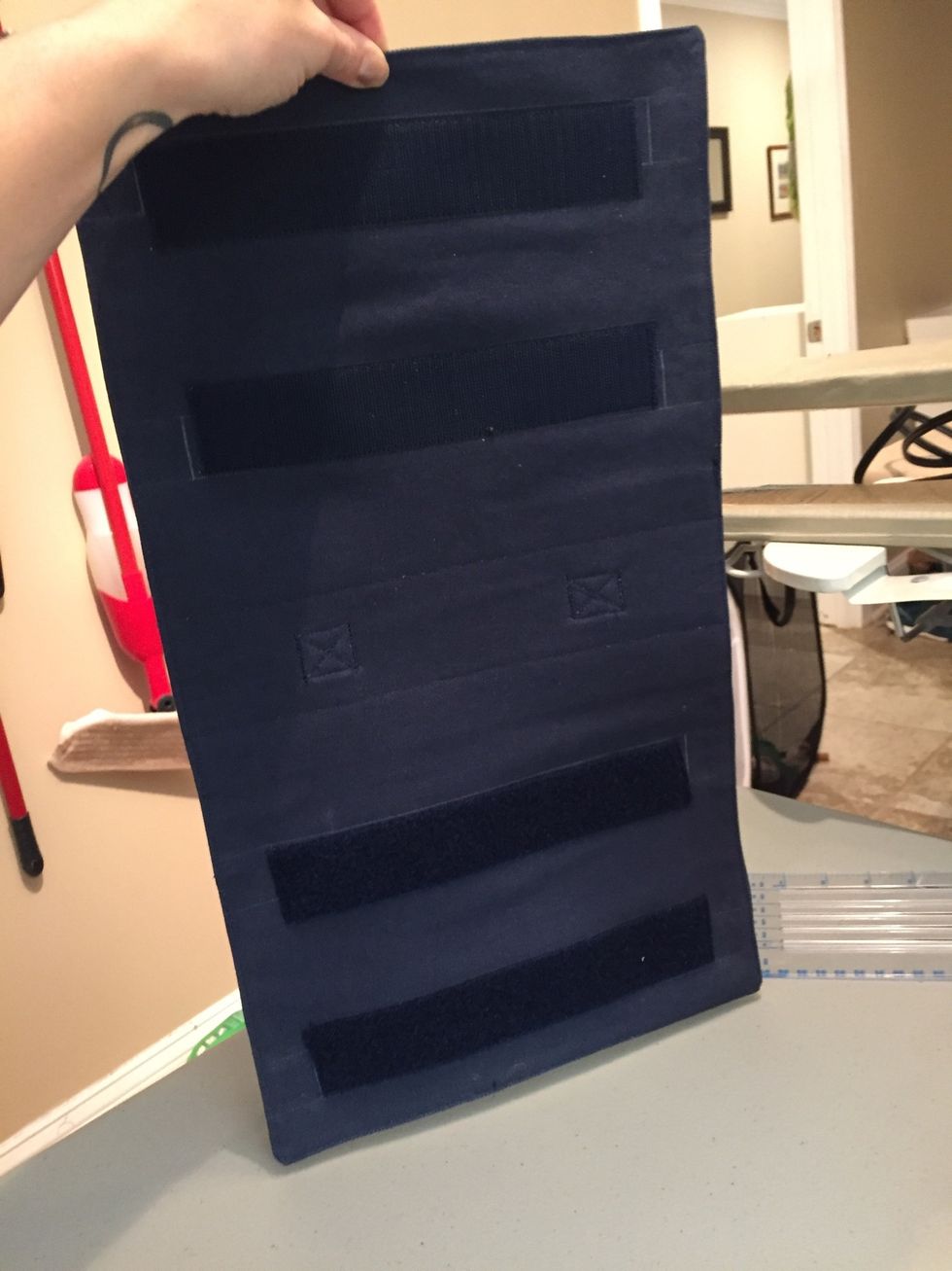 Sew Velcro strips on to back side.