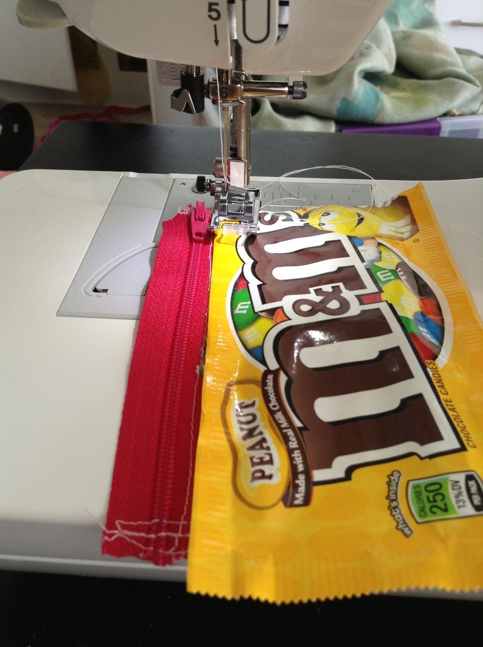 Sew zipper onto wrapper