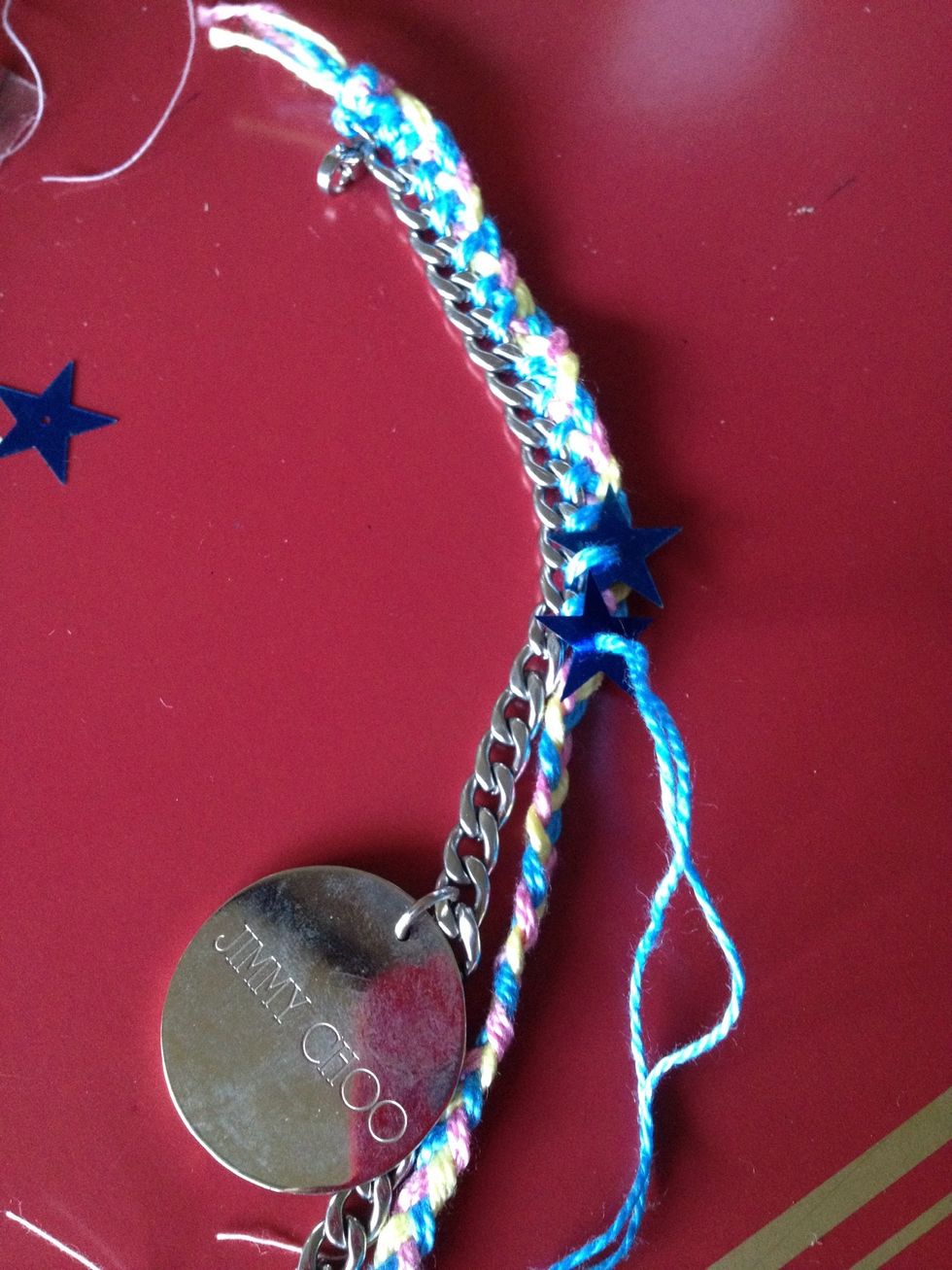 Sewing pastel braid with chain bracelet and sew some star on it wherever u want! Please use one of 3 colors that u braid.