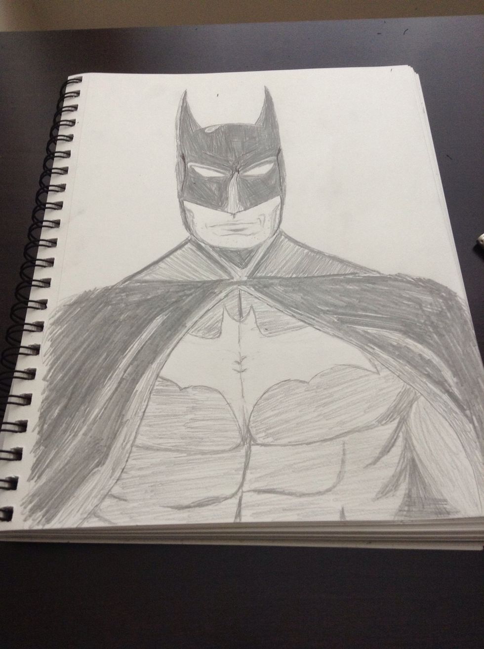 Shade in and shade lightly on some parts to make it look like the area has light reflecting off of it.