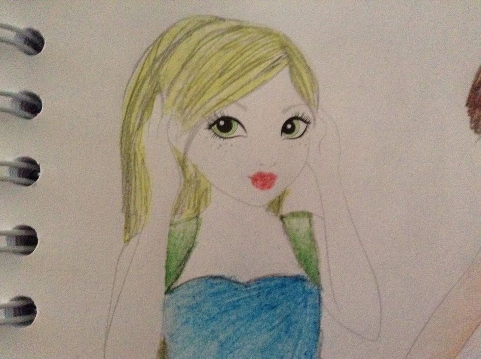 Shade in the lips and hair. The eyes can be either blue or green and any shade that you want. Then do the skin.