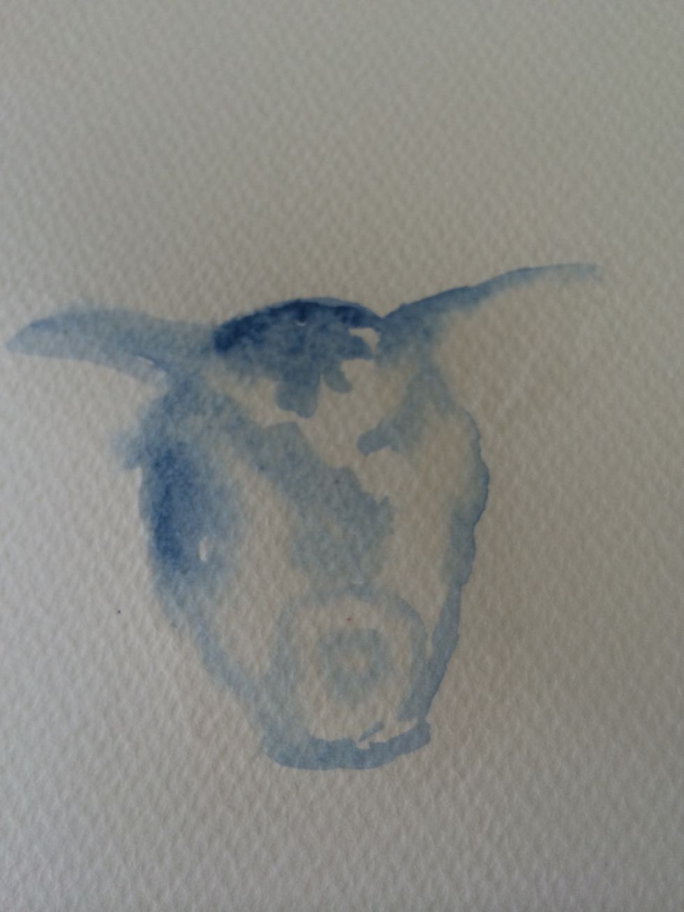 Shade in with more of your base colour and leave a V shape at the top of the head