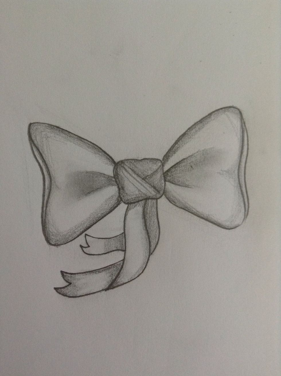 Shade the ribbons and go back with your eraser to add highlights where needed. You're done!\ud83c\udf80\ud83d\udc4d