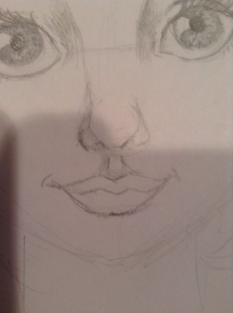 Shade those two line things below the nose and above the lips. Lightly, though. We don't want her to have a mustache :D