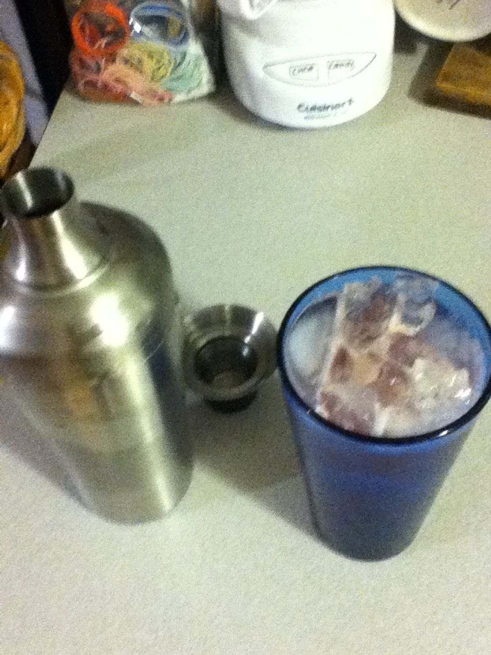 Shake and pour, lover. Look at that beautiful color. This one is made for a hot North Carolina day in the sunshine. Members of the LGBT community can add a maraschino cherry to this.