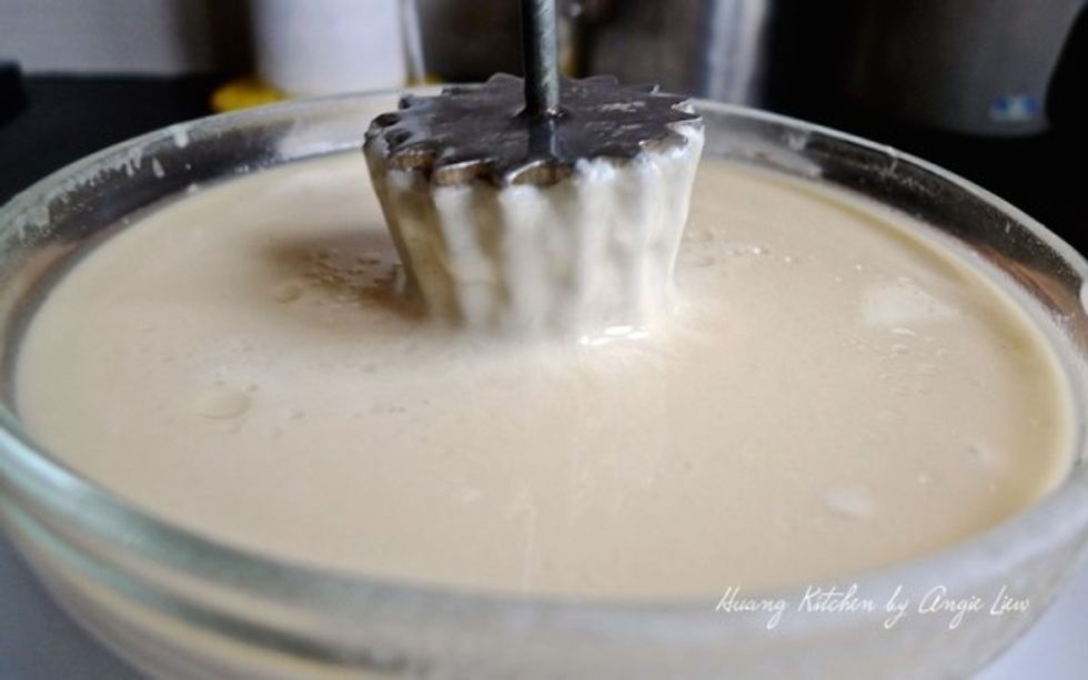 Shake off excess oil and dip the mold into the batter until it's coated up to about 95% level (almost to the edge) making sure it's well coated on the sides and bottom.