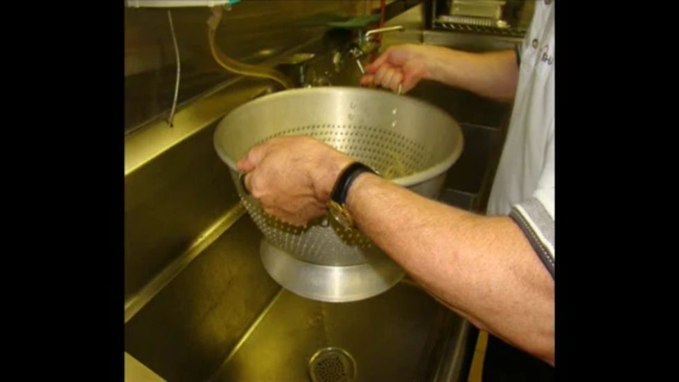 Shake off excess water.