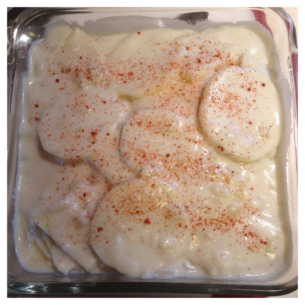 Shake pan to settle the sauce and sprinkle with paprika.