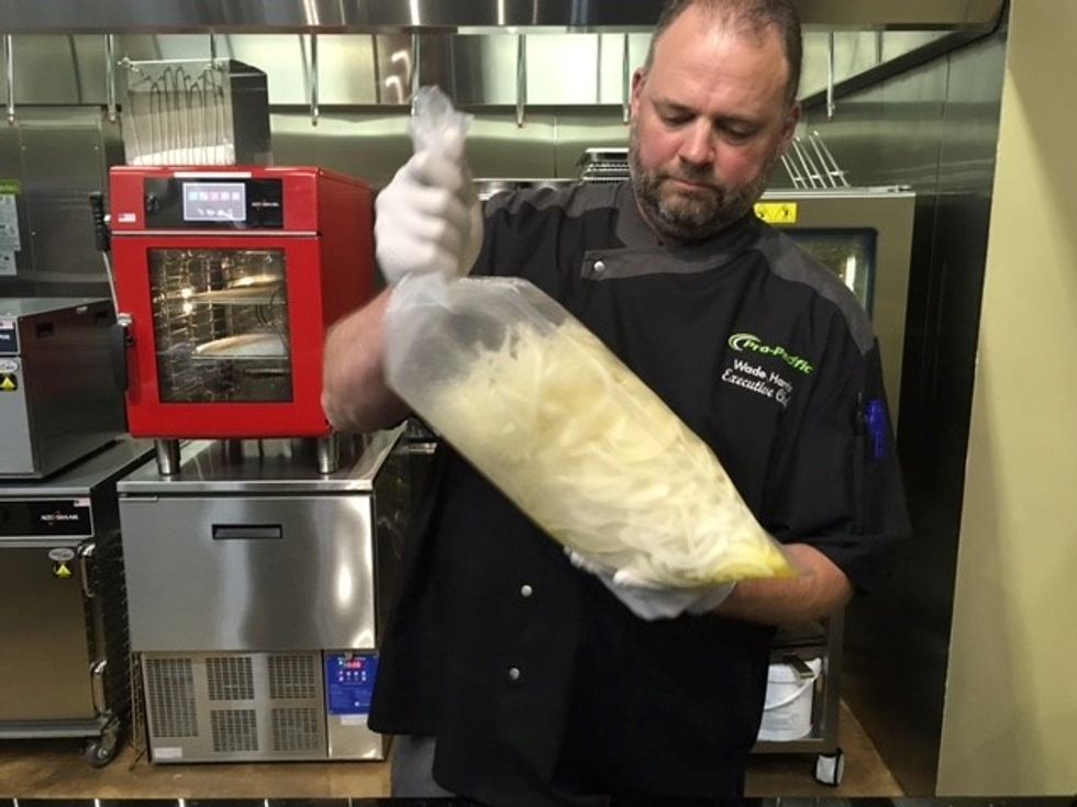 Shake the bag to mix the butter, salt & white pepper until all onions are evenly covered.
