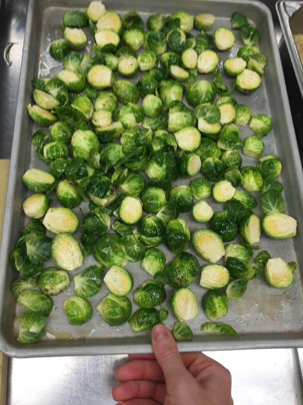 Shake tray to evenly flatten out the brussels sprouts.