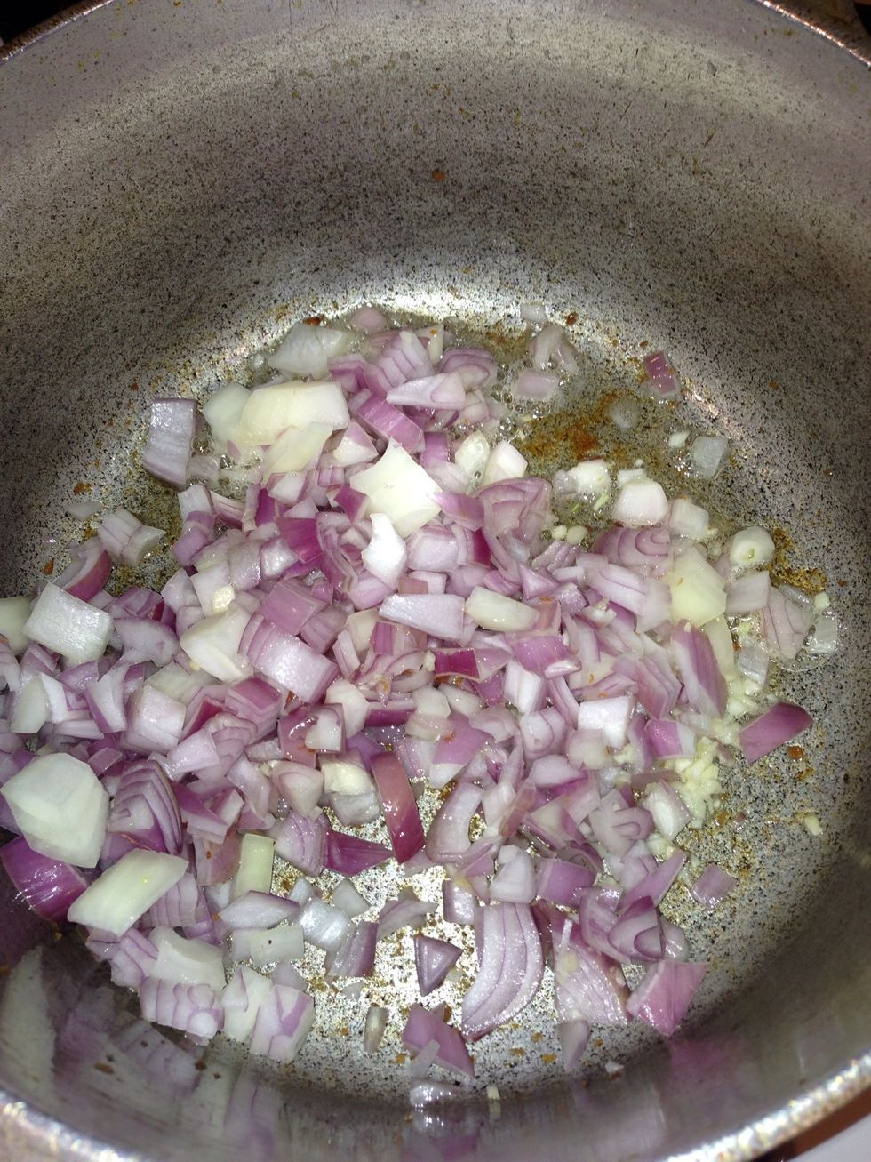 Shallots & garlic into the pot