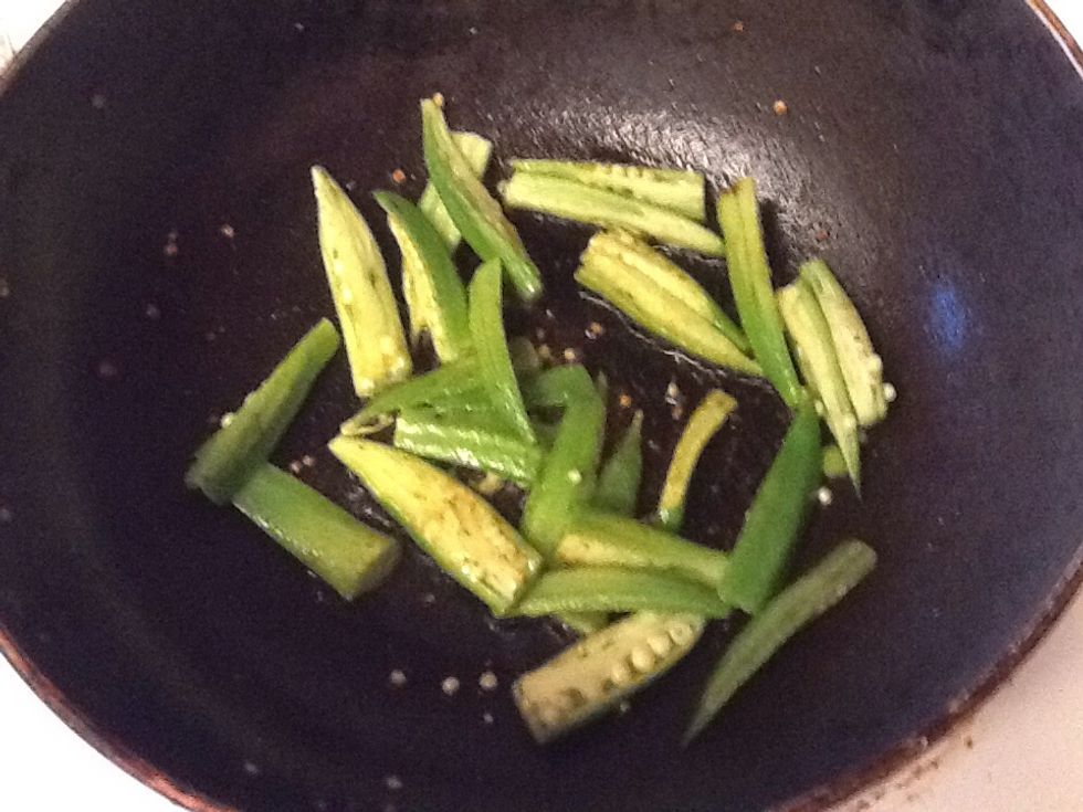 Shallow fry them in batches. Add very little turmeric and salt. We will add salt finally to the curry.