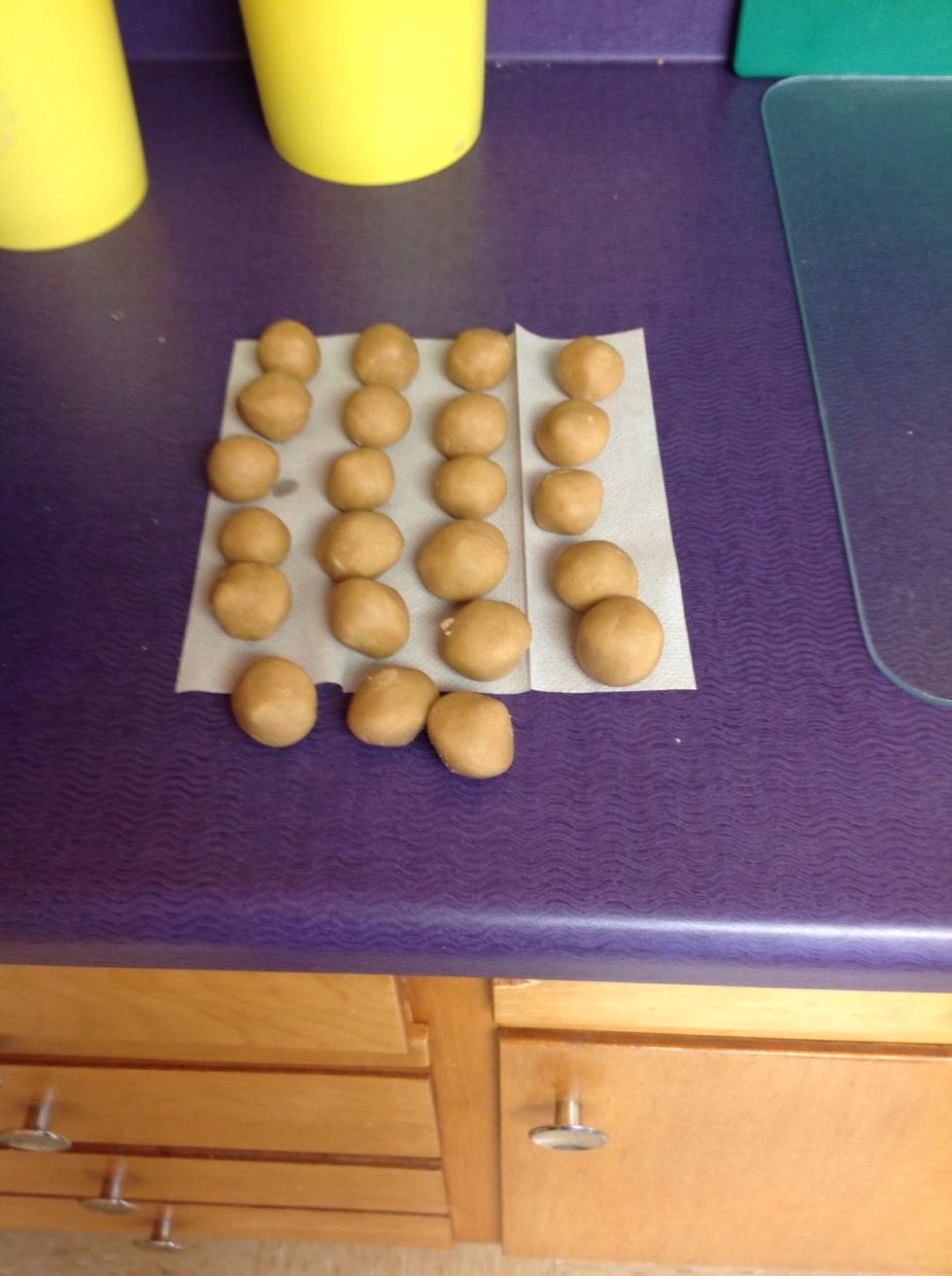 Shape dough into 1 1/4-inch balls.