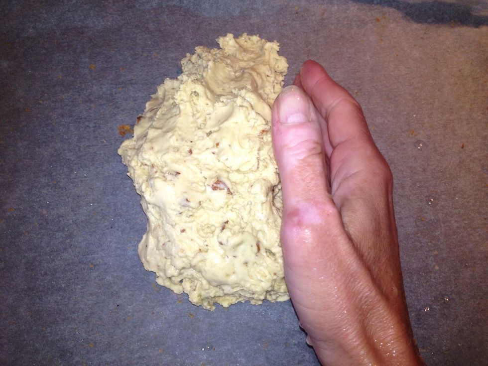 Shape dough with wet hand into a bread shape